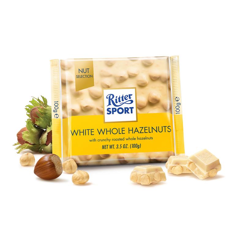 РИТЕР СПОРТ БЕЛО ЧОКОЛАДА СО ЦЕЛИ ЛЕШНИЦИ 100 ГР